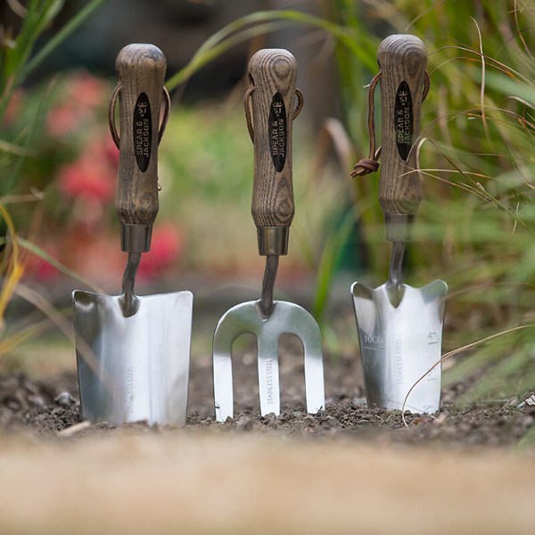 Buxtons - Arborist Equipment & Garden Machinery Experts 36 Three garden tools in a garden.